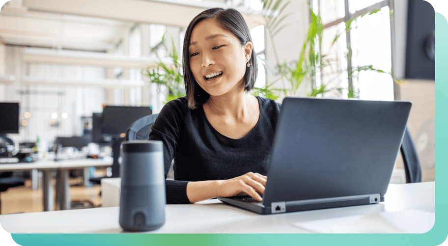 woman engaging with smart speaker