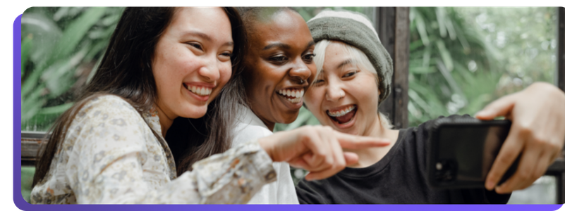 Close up of three women, using social app
