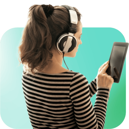 Woman listening to music in AR app on tablet with headphones