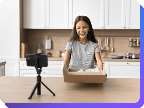 photo of content creator making unboxing video