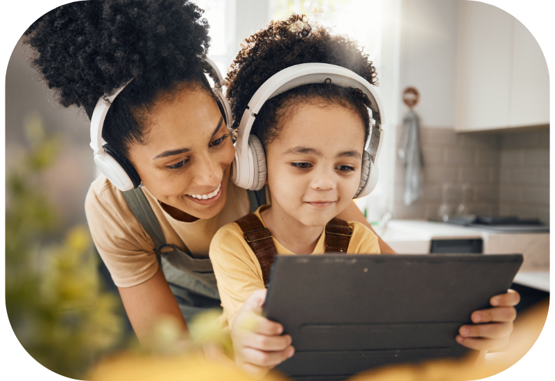 woman and child listening to clean music app on tablet